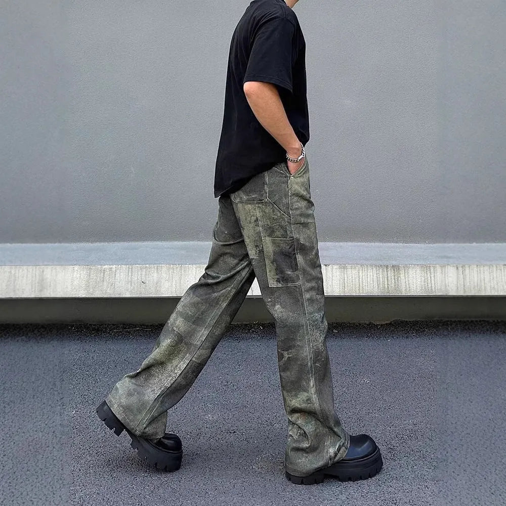 Men's straight-cut camouflage print denim jeans on a white background.