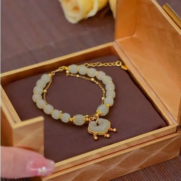 Women's green safety lock bell pendant bracelet with double-layer design and electroplated finish