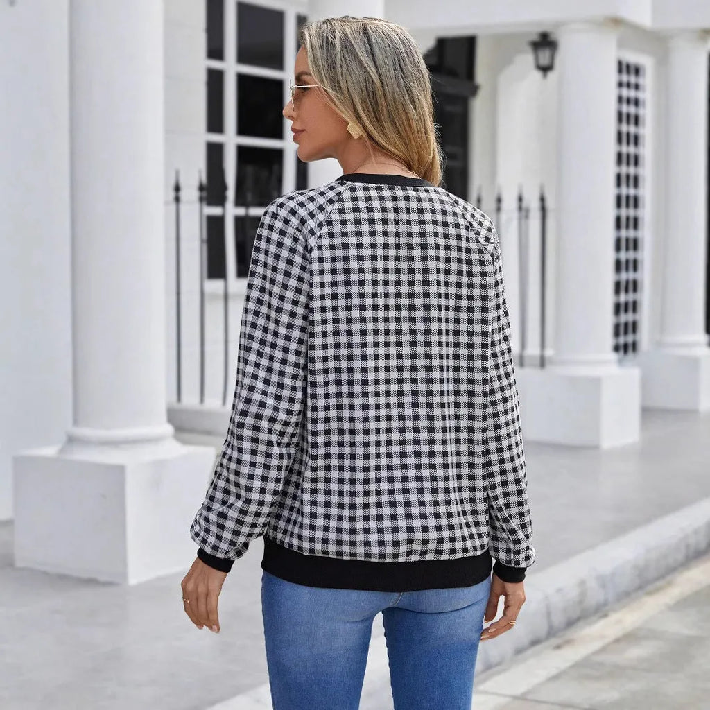 Black pullover sweater with Japanese plaid and printed stripe patterns, long sleeves