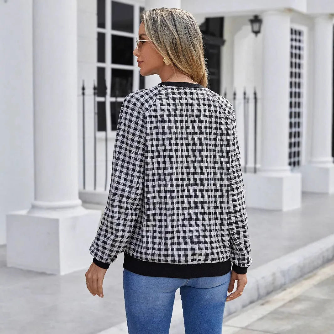 Black pullover sweater with Japanese plaid and printed stripe patterns, long sleeves