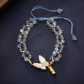 Grey moonstone butterfly charm woven bracelet for women with geometric retro design