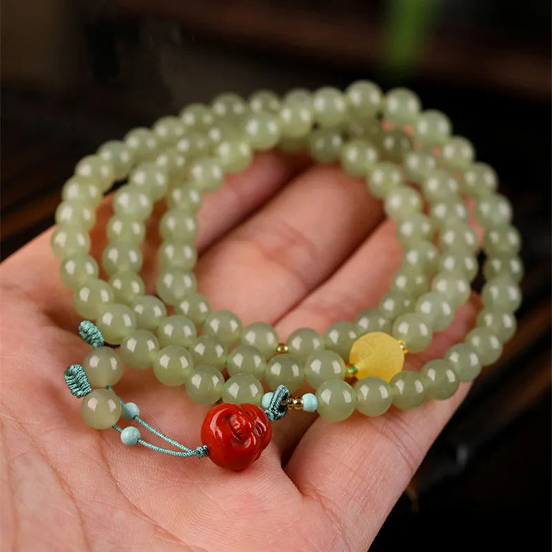 Pale blue Hetian Jade bracelet with 6mm beads in three circle female design