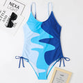 Women's blue sleeveless backless one-piece swimsuit with fixed swimming trunks for swimming sports