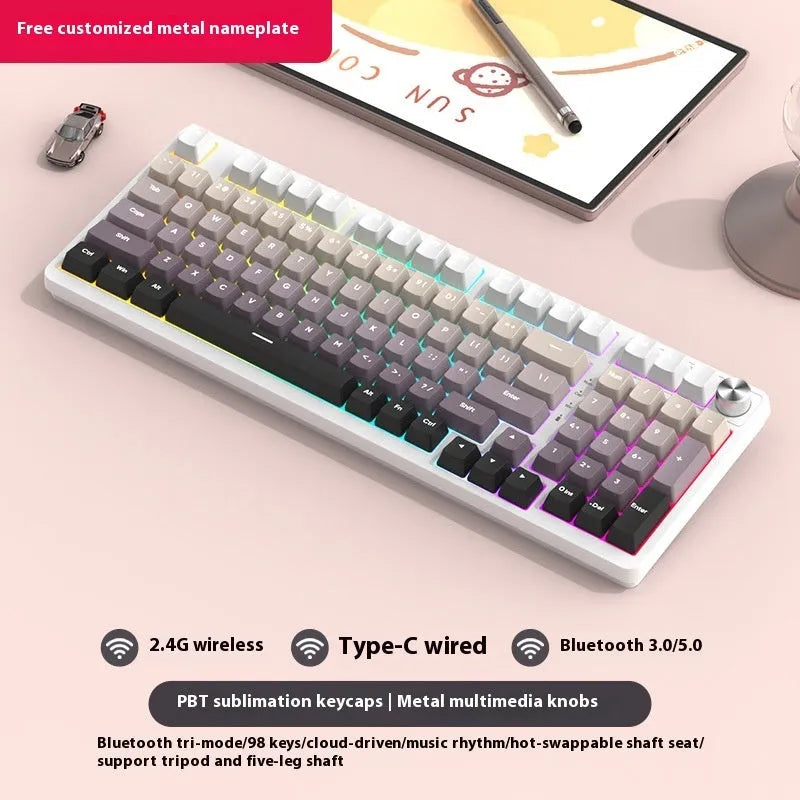 98-key wireless mechanical keyboard with metal knob on desk, showing misty rain colour scheme background.