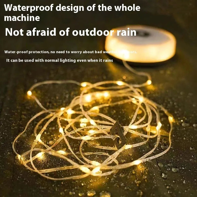 Long strand of 30 rechargeable LED bead lights for outdoor tents, showing warm white and colourful lighting options.
