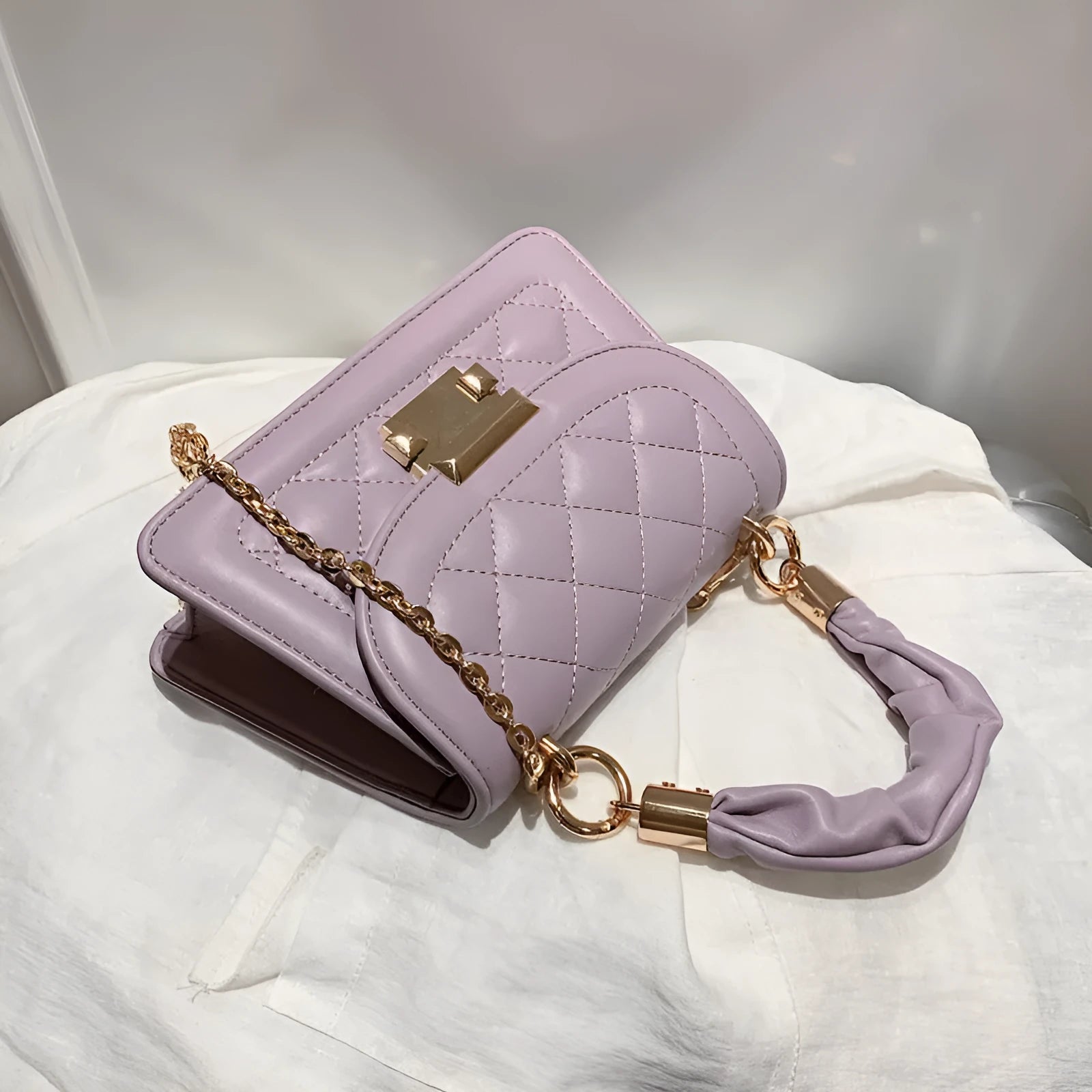 Korean-style purple PU small square shoulder bag with tapered 16-19cm width dimensions