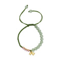 Hand woven red rope bracelet with lily floral design in national style