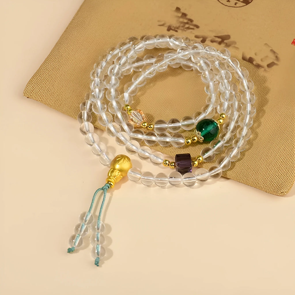 White crystal geometric bead 108 rosary bracelet laid flat, showcasing its unisex ethnic style design.