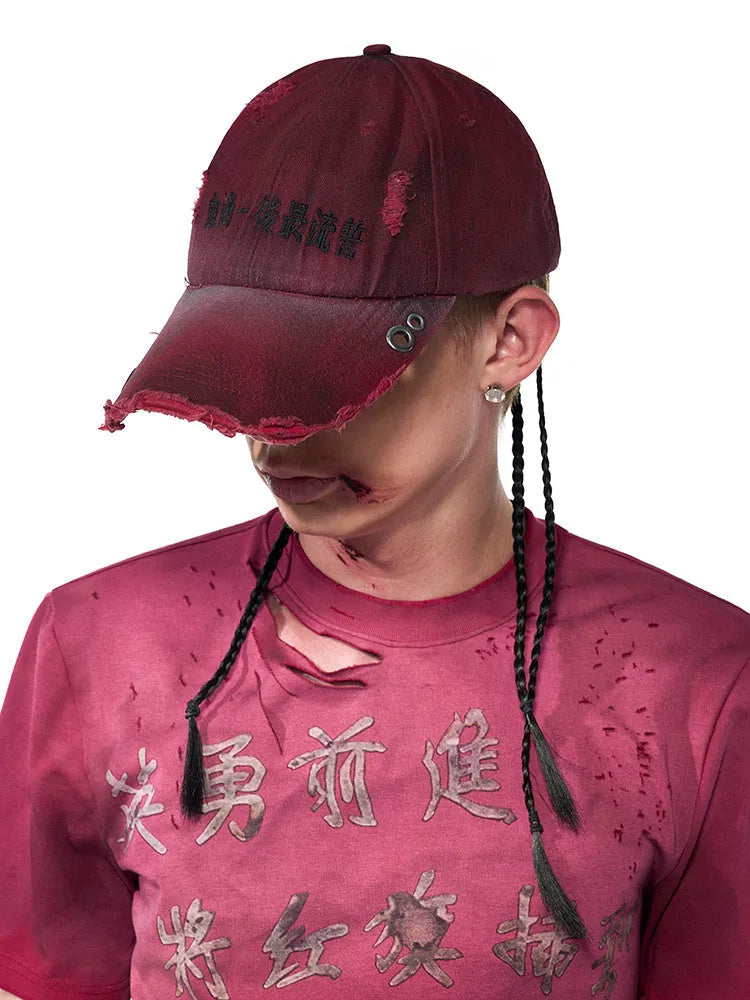 Rose red cotton peak cap with adjustable strap and spray design detail