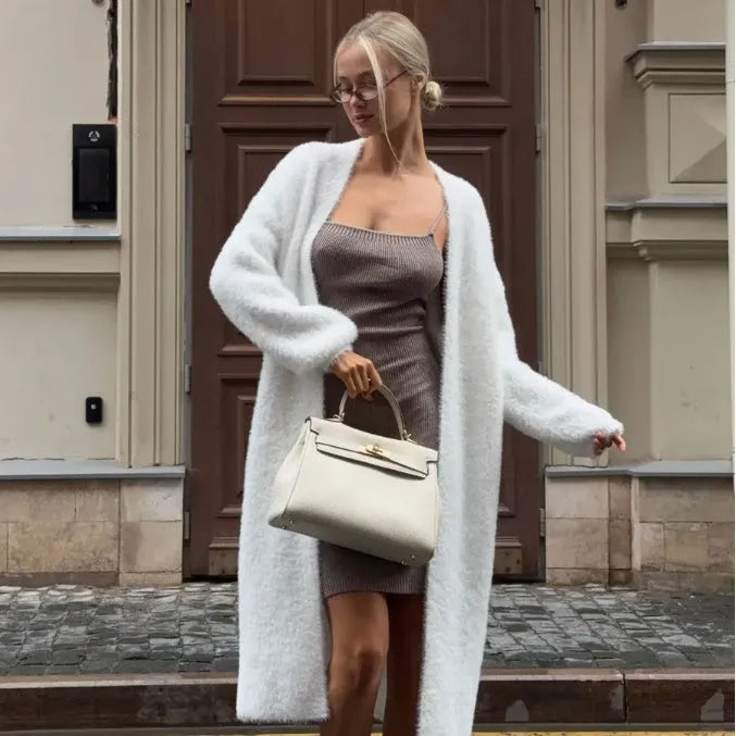 White knitted cardigan jacket with extended length and regular sleeves