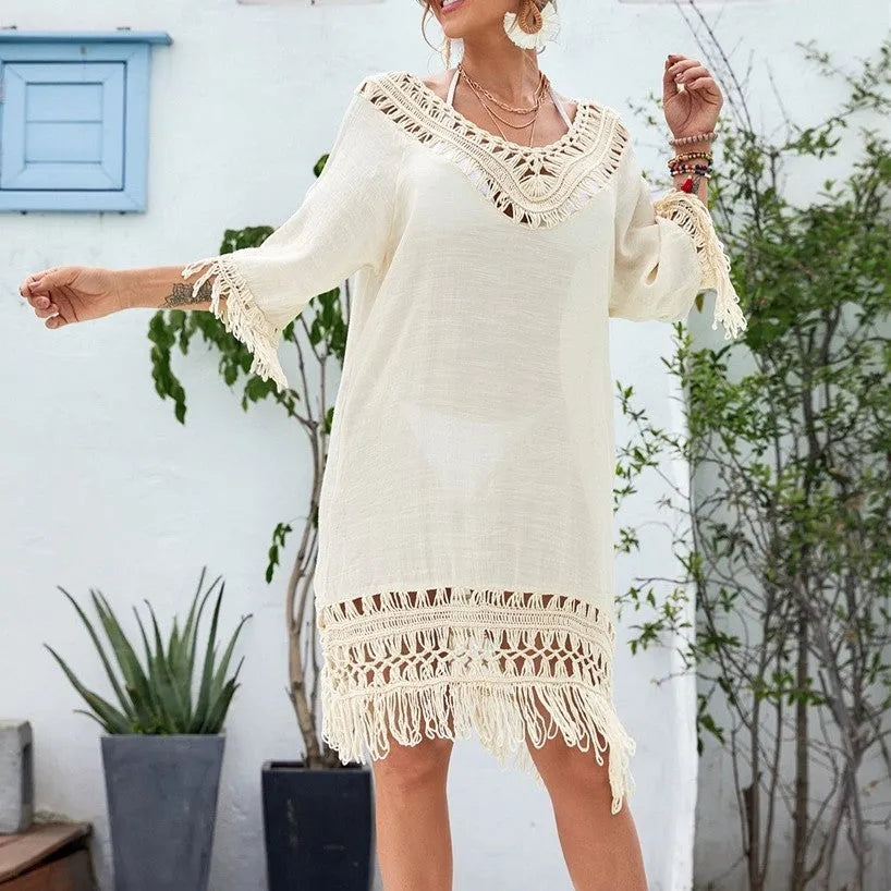 Women's apricot crochet patchwork beach dress with half sleeves, shown on a hanger.