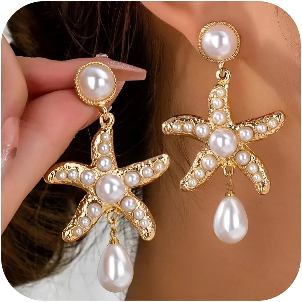 Women's silver-tone pearl starfish earrings on light background