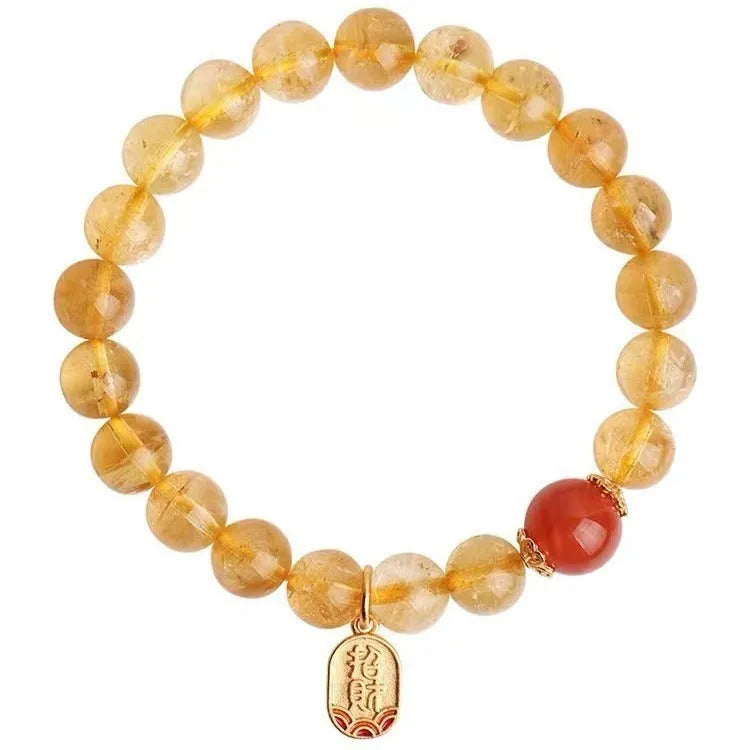 Polished red agate bead bracelet showing gold ruby colour, offered in 6mm, 8mm and 10mm bead sizes.