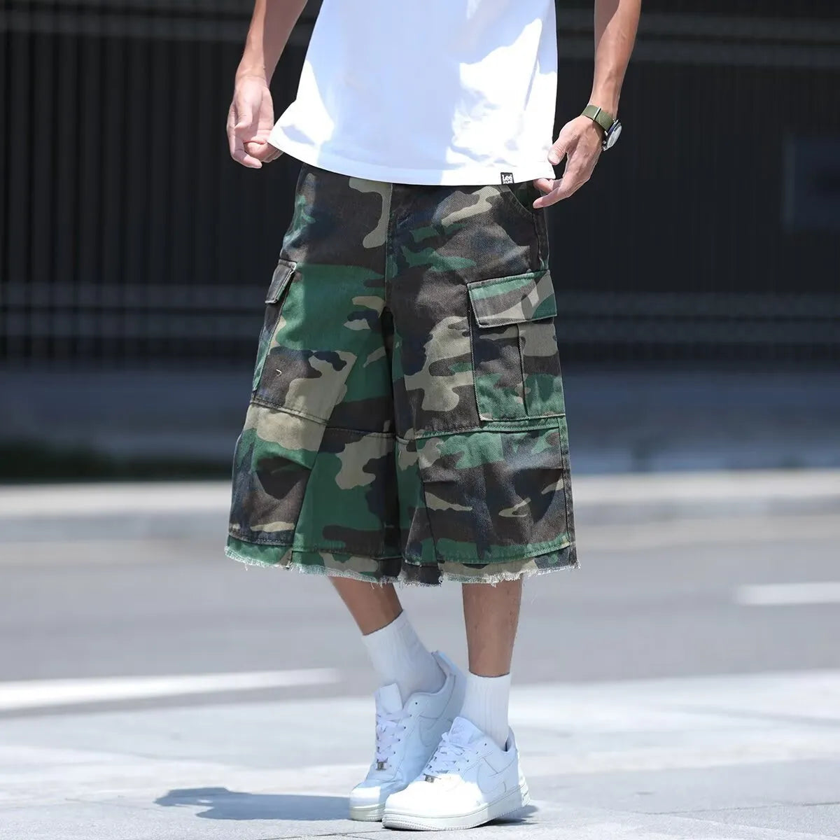 American retro workwear shorts in camouflage patterns with loose fit cropped design for summer