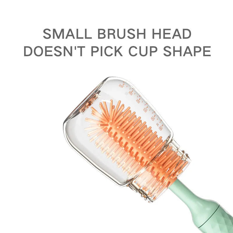 Pink electric bottle brush with rotating silicone head for cleaning baby bottles and pacifiers
