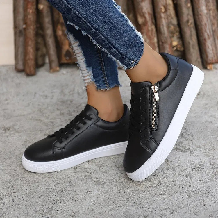 Women's casual sports shoes with side zipper, artificial PU upper, and rubber sole in black