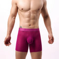Men's white lace mesh boxer shorts with low waist design on a neutral background.