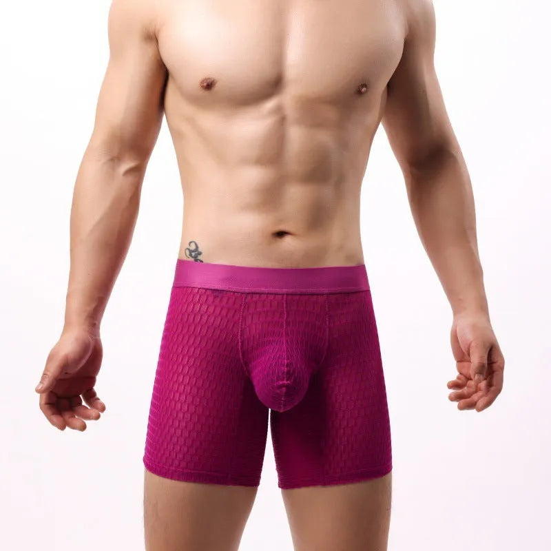 Men's white lace mesh boxer shorts with low waist design on a neutral background.
