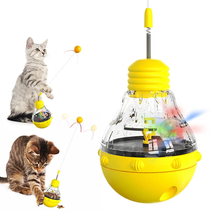 Green rocking cat wand toy with teaser stick, plastic ball and ribbon attachments