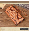 Retro brown embossed Chinese floral pattern tri-fold leather wallet open showing interior compartments.