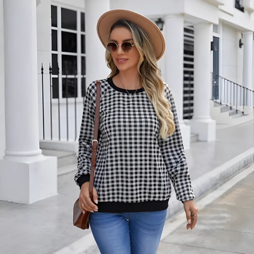 Black pullover sweater with Japanese plaid and printed stripe patterns, long sleeves