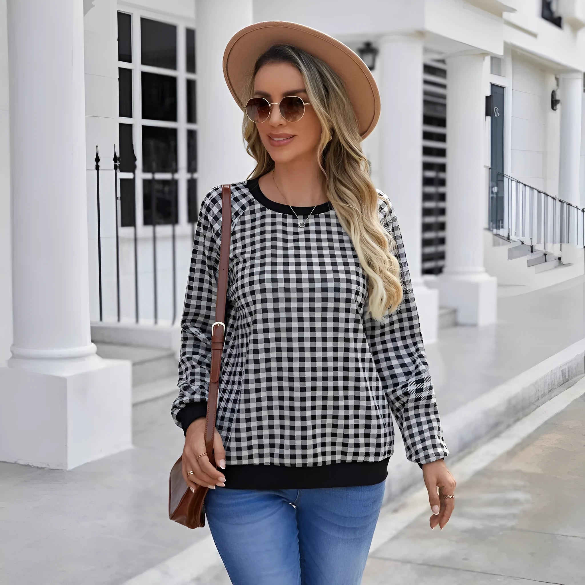 Black pullover sweater with Japanese plaid and printed stripe patterns, long sleeves