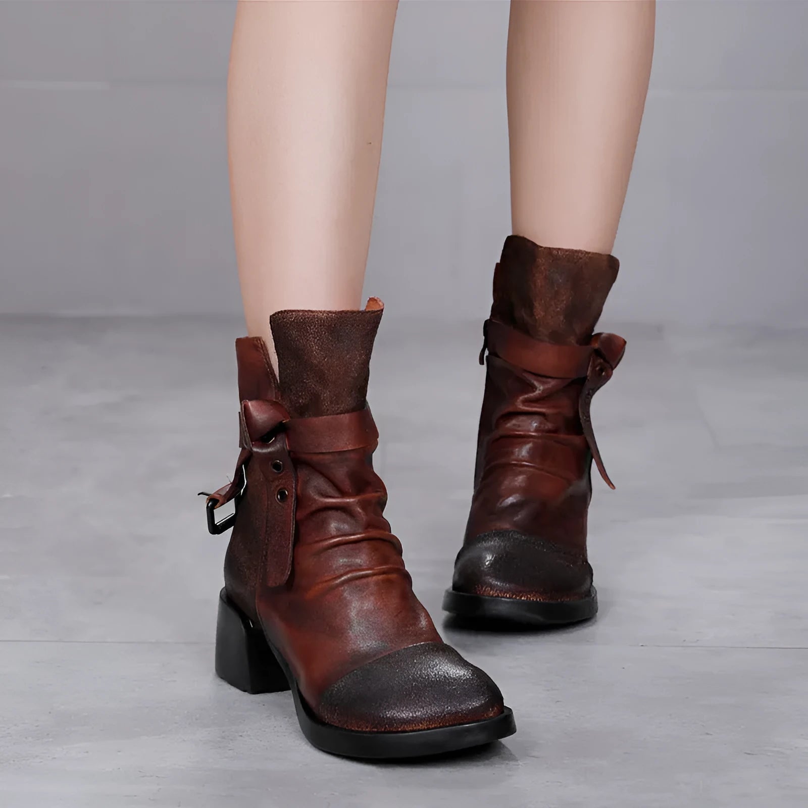 Women's brown retro chunky heel ankle boots with round toe and genuine leather upper.