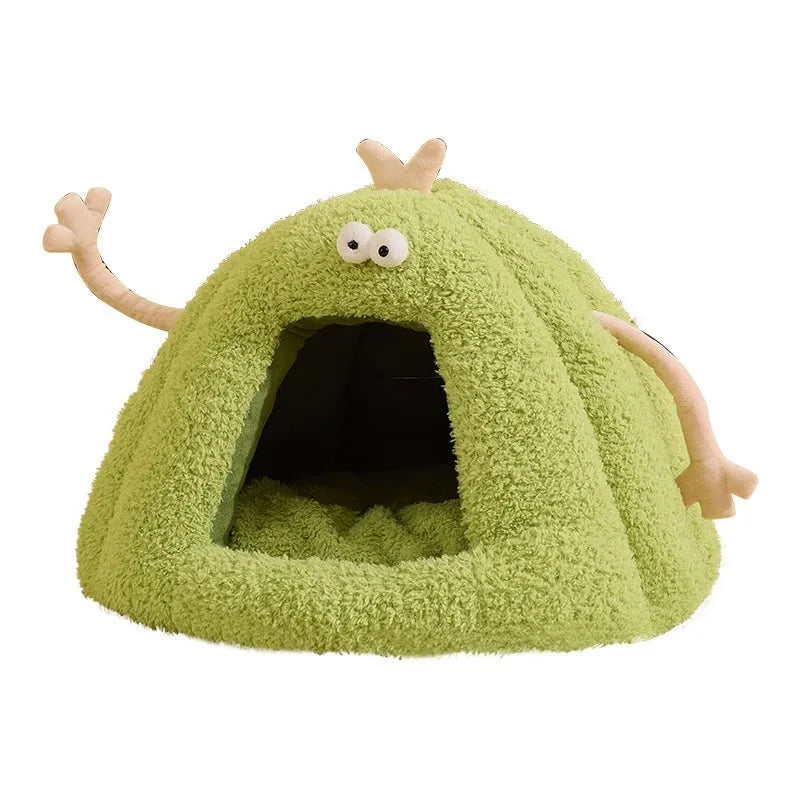 Green monster-shaped semi-enclosed cat kennel bed with ears and a removable cushion.
