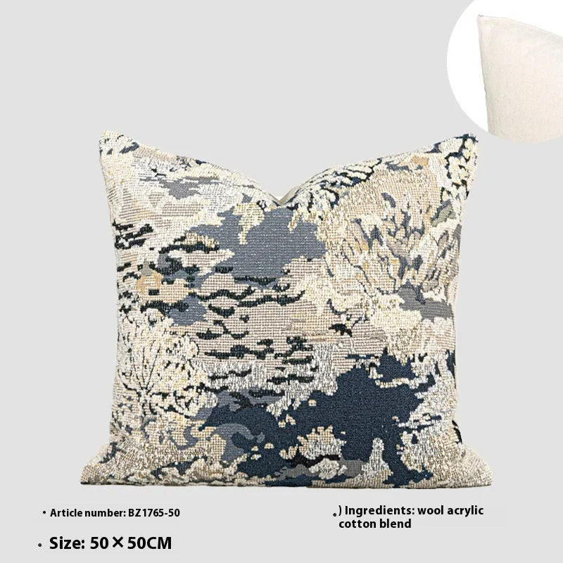 Chinese style antique blue floral pattern decorative cushion with wool blend cover on a sofa.
