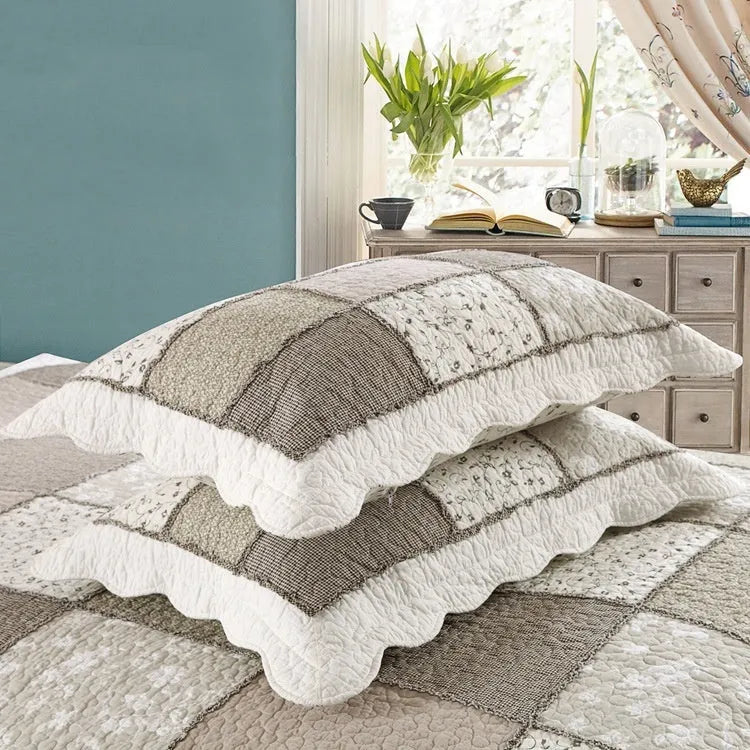 Pure cotton quilted bedspread and two pillowcases set on a bed, showing a Korean style pattern.