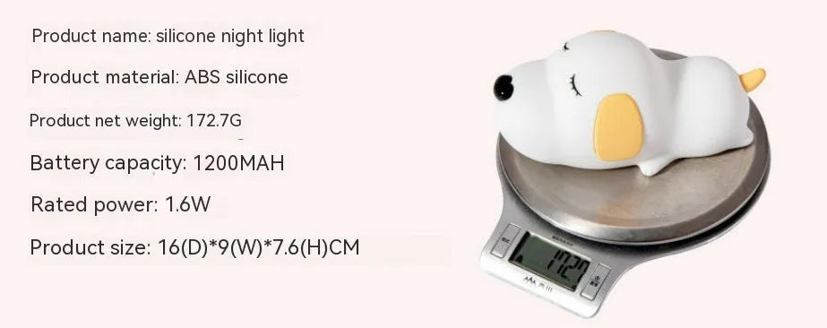 Cute two-tone cartoon dog silicone night lamp with USB cable for charging.