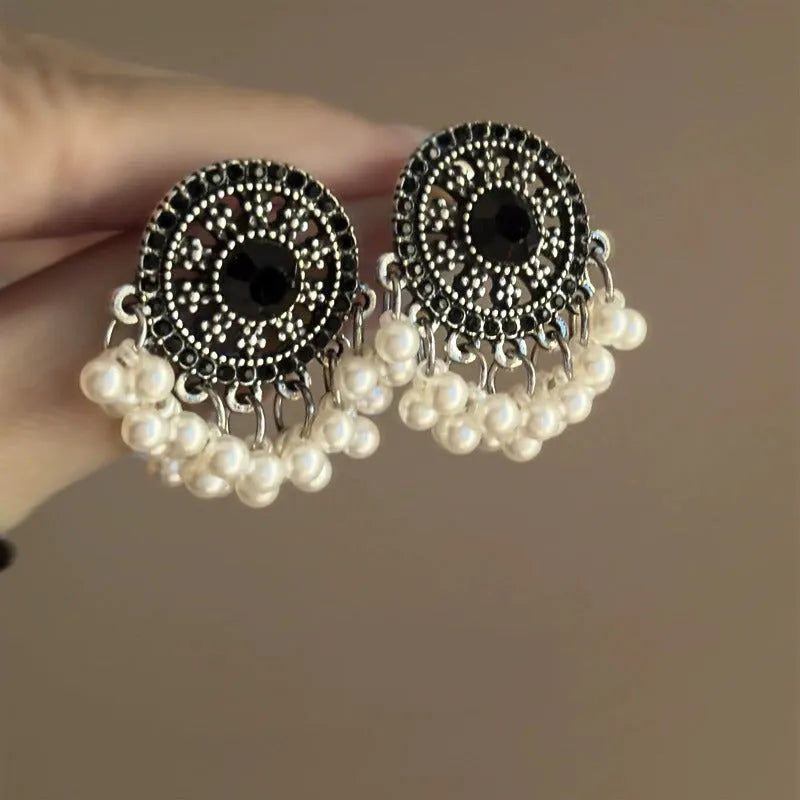Pair of Miao maiden pearl earrings in round geometric shape with electroplating finish