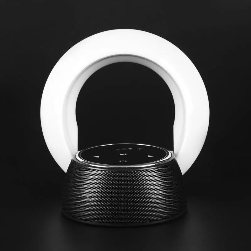 Blue Bluetooth desk lamp speaker with folding design and touch controls showing LED lighting