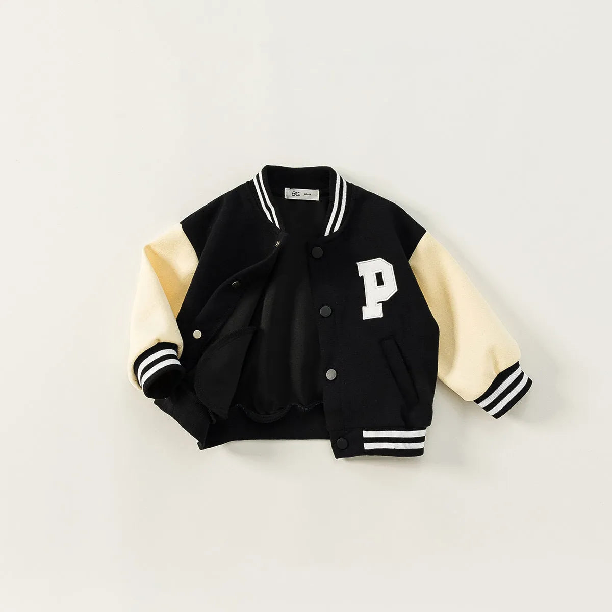 Black thickened velvet winter coat for children with round collar and letters pattern, front view