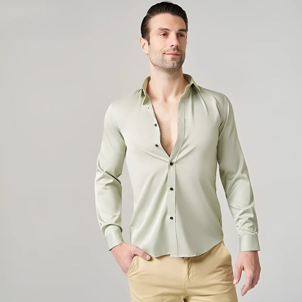 Men's stretch long sleeve work shirt in polyester fabric shown in a light colour, featuring a button front and long sleeves.