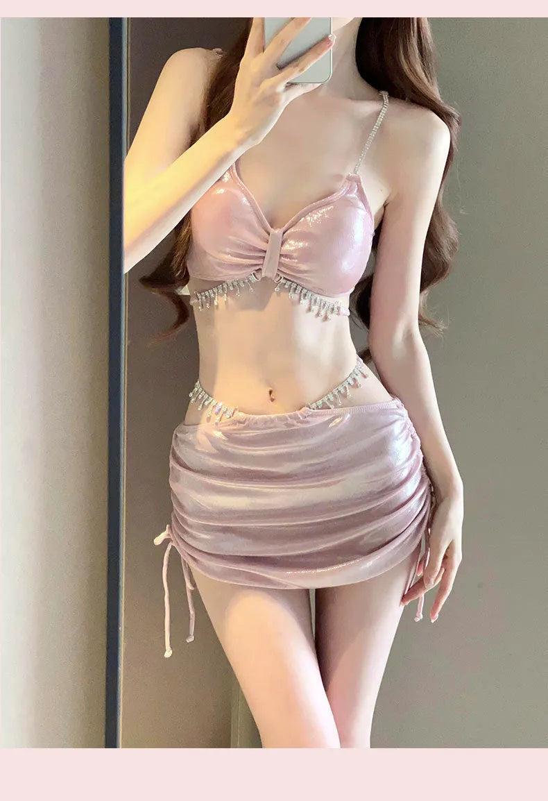 Women's black or pink solid colour polyester bikini swimsuit set for swimming.