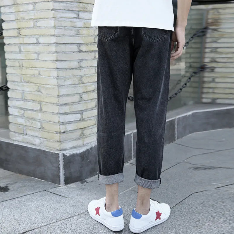 Men's loose straight harem jeans in black or blue cotton denim with high waist