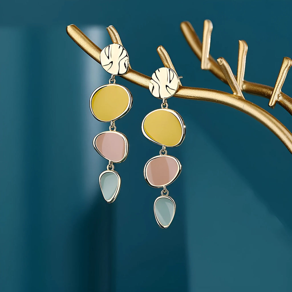 Sterling silver finish Morandi three-colour drip oil wafer disc earrings.