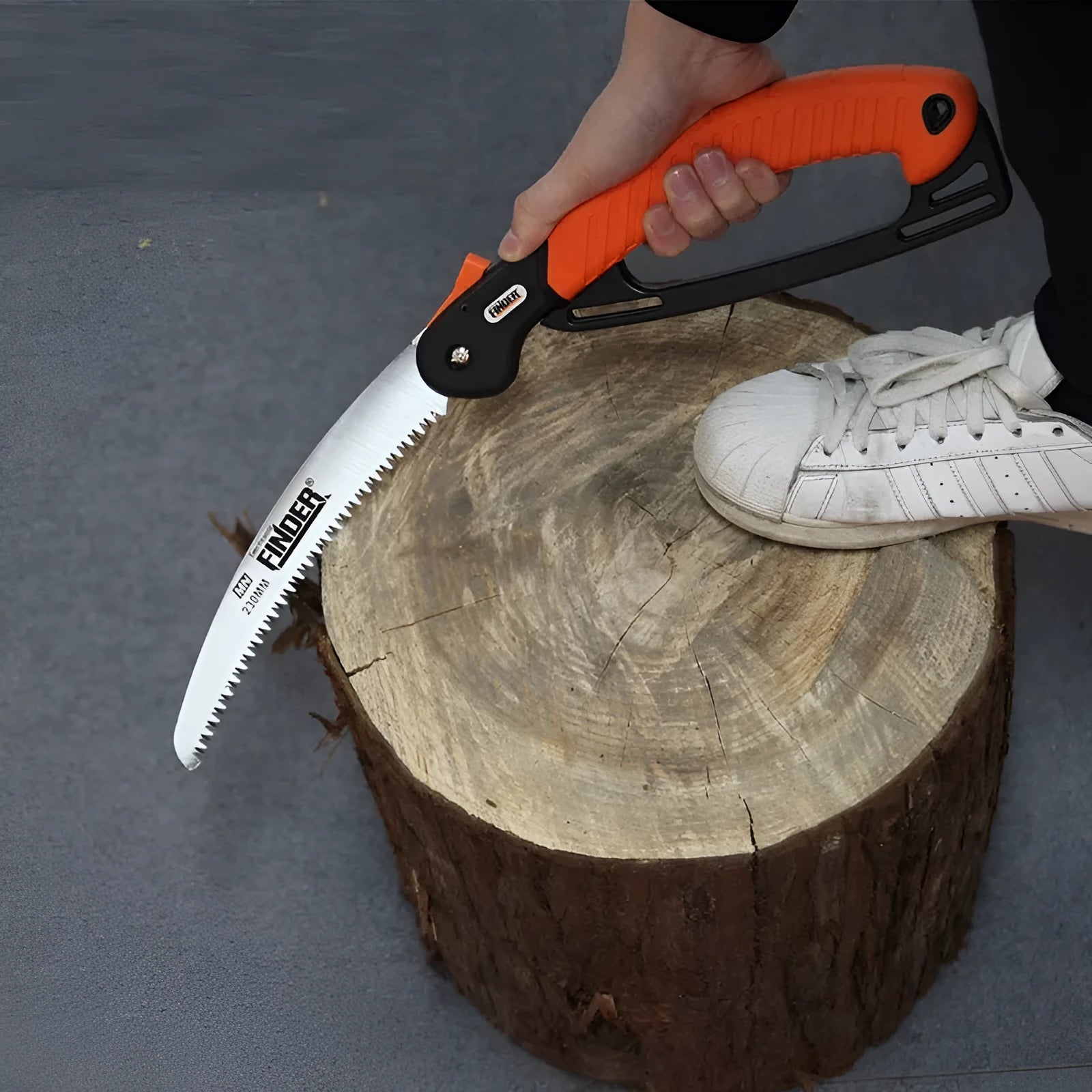 Folding garden pruning saw with a 230mm blade and black TPR grip shown open and closed.