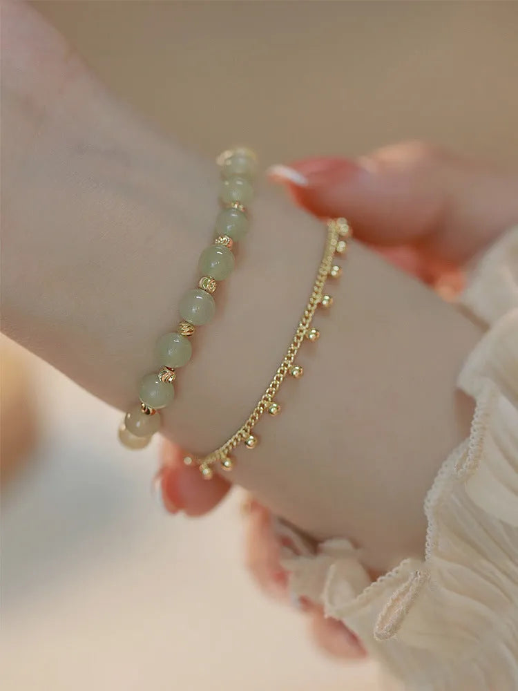 Natural Hetian jade bracelet with manual craft princess running bead design
