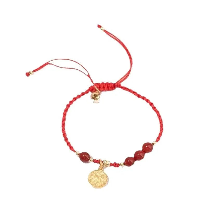 Cinnabar bracelet with braided rope and peach blossom charm for exam luck
