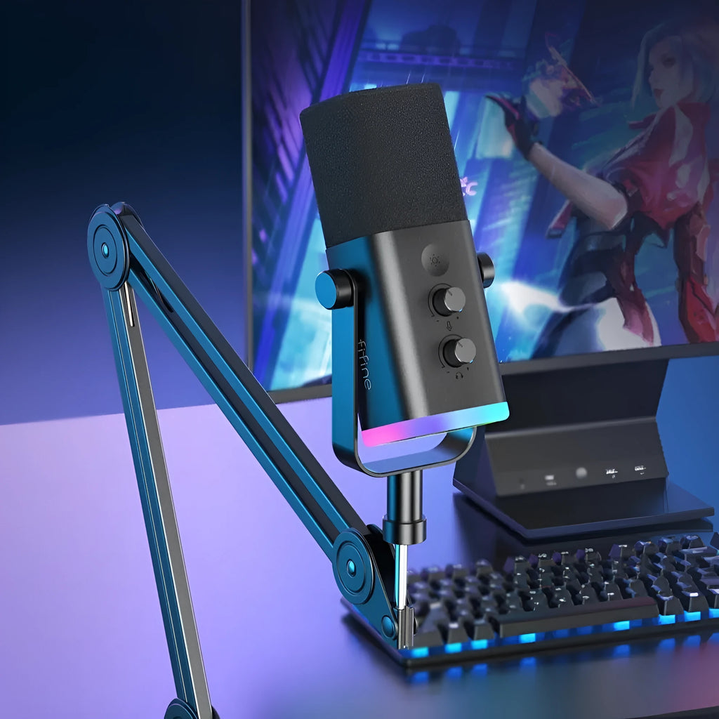 Dynamic noise reduction microphone in black, pink, or white with XLR and USB cables on a desk.