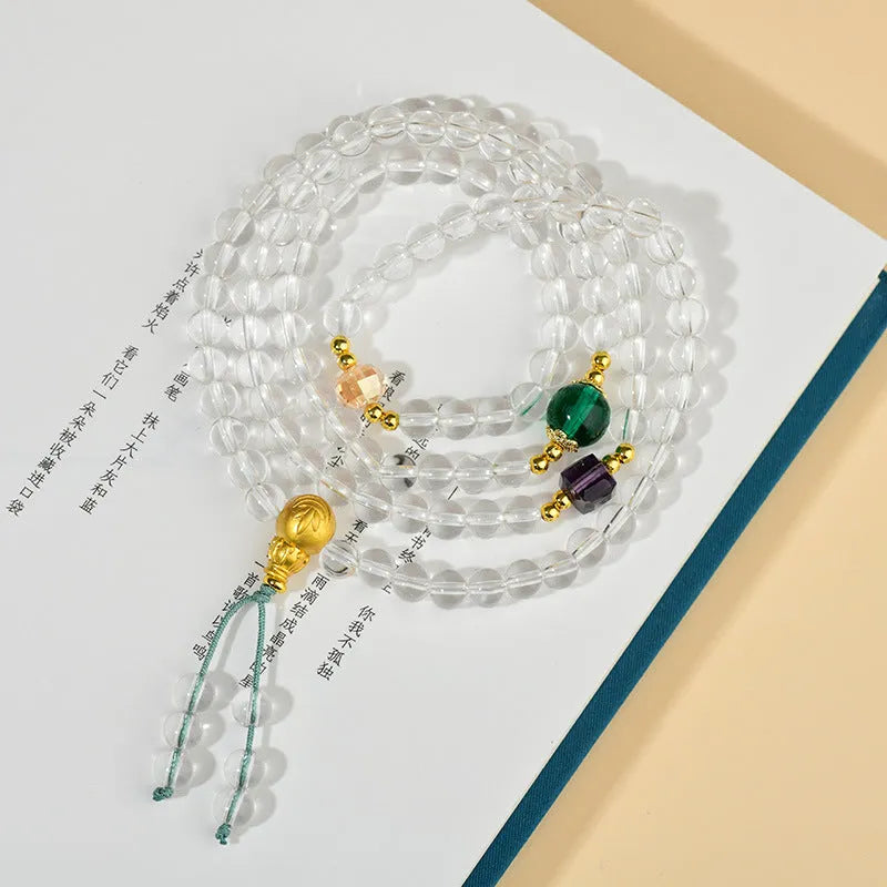 White crystal geometric bead 108 rosary bracelet laid flat, showcasing its unisex ethnic style design.