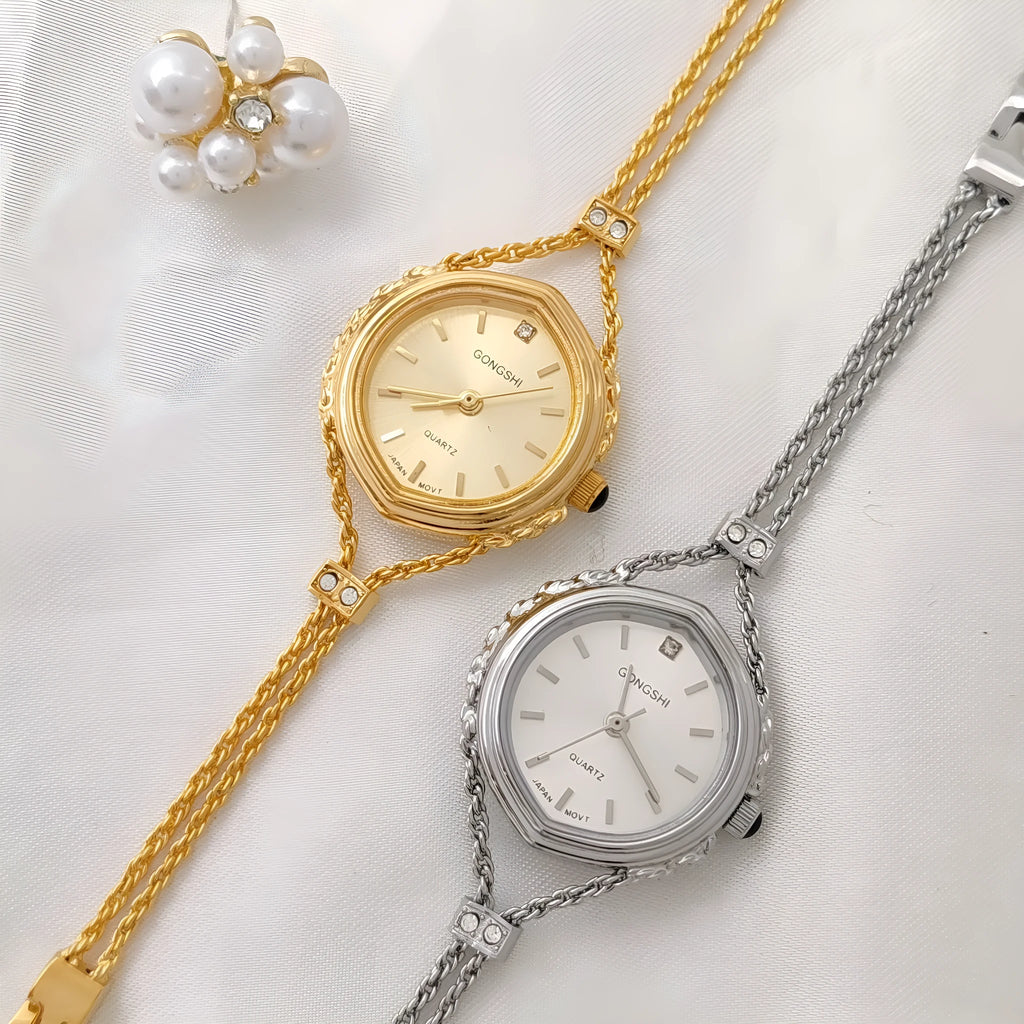 Women's Mori style quartz watch with 25mm dial, 7mm thickness, mineral glass face and chain strap in gold or silver