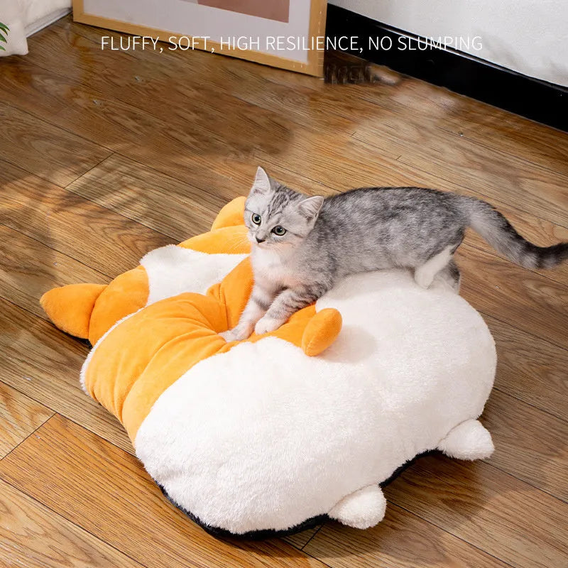 Orange semi-closed cat sleeping bag bed with integrated mat, 65cm long.