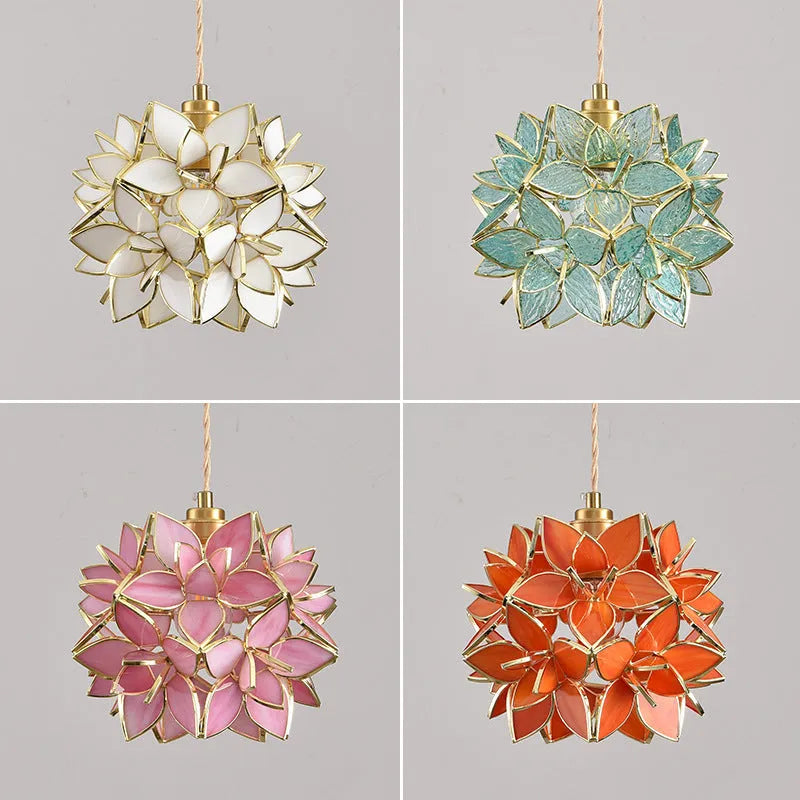 Stained glass line chandelier hanging from ceiling with colourful glass shades and copper lamp head