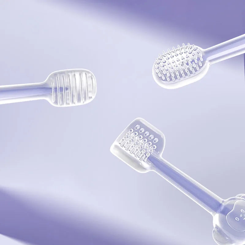 Silicone pet toothbrush for dogs and cats in blue, green, and purple colours on a white background.