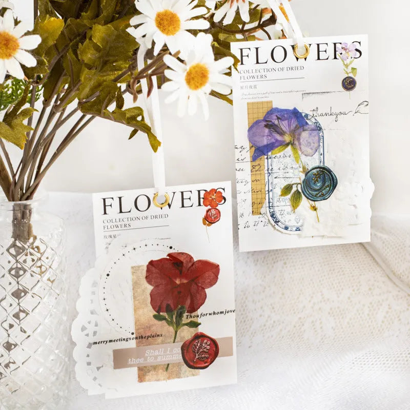 Set of 40 dried flower theme decorative stickers in eight colour styles including purple, blue, orange, and pink.