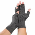 Grey half finger joint compression gloves showing anti-slip palm surface and breathable fabric construction
