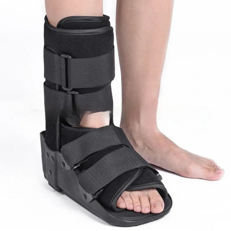 Grey and black Achilles tendon rehabilitation walking aid boot with straps, shown in sizes S, M, L, XL.